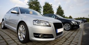 Car dealer showing a vehicle at an auto dealership in Australia